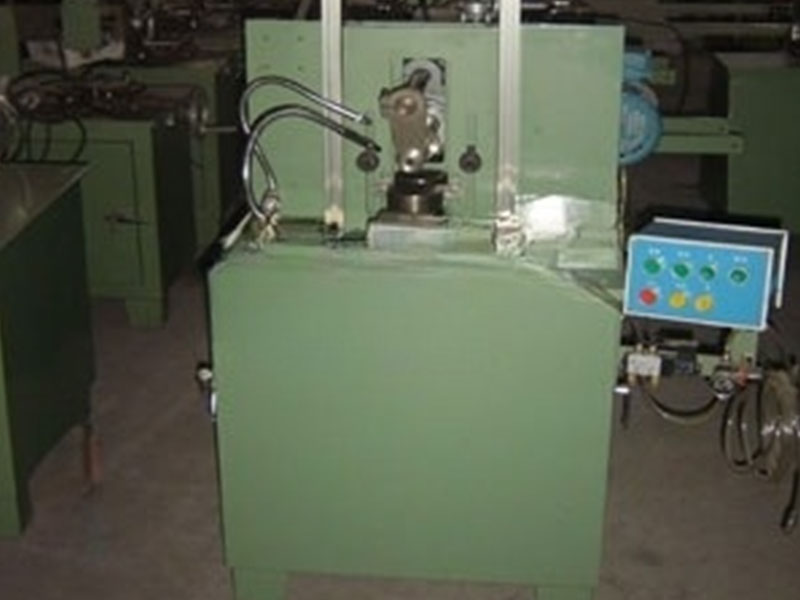 เครื่องกัดวงแหวนนอกแบบม้วนอัตโนมัติ